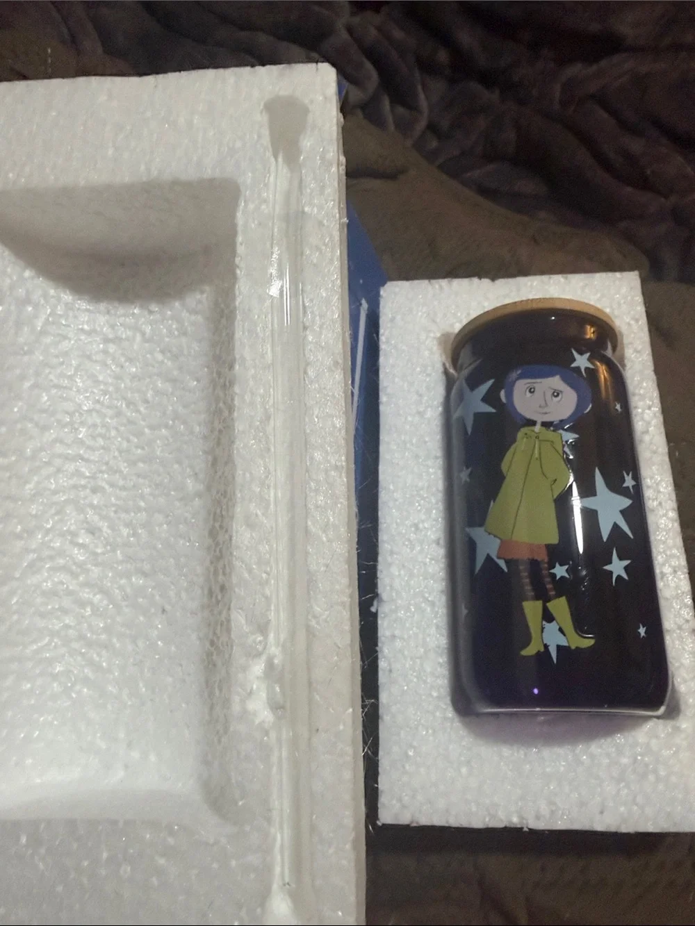 Purple Glass Bottle with Character Print and Yellow Lid